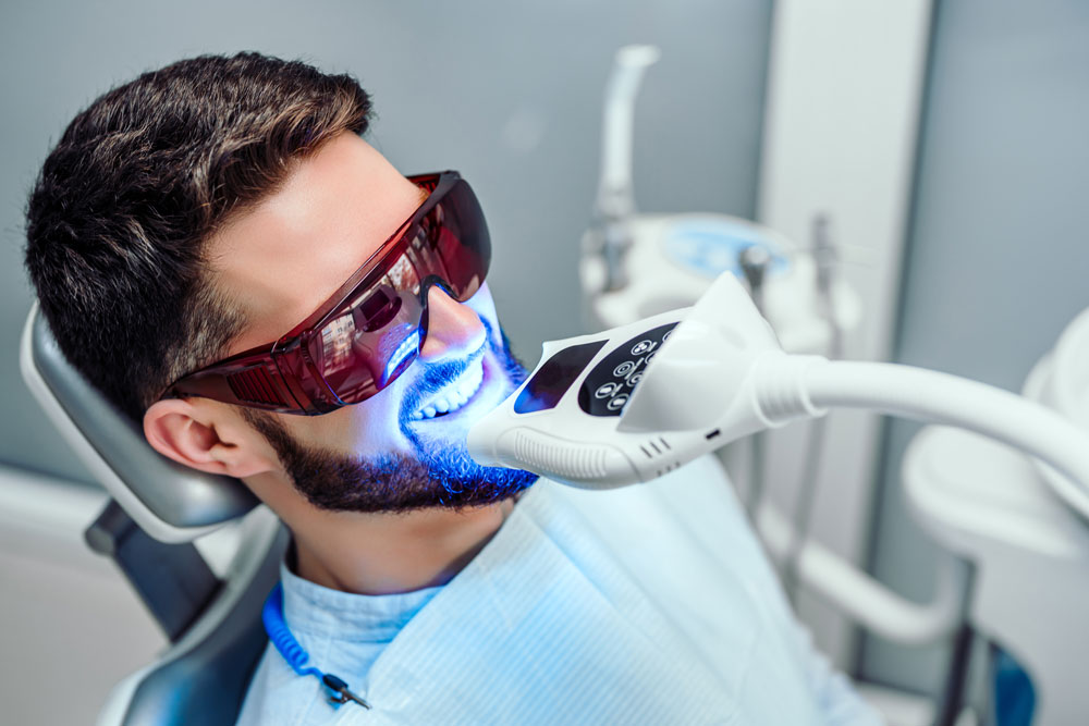 patient having in-house Laser Teeth Whitening